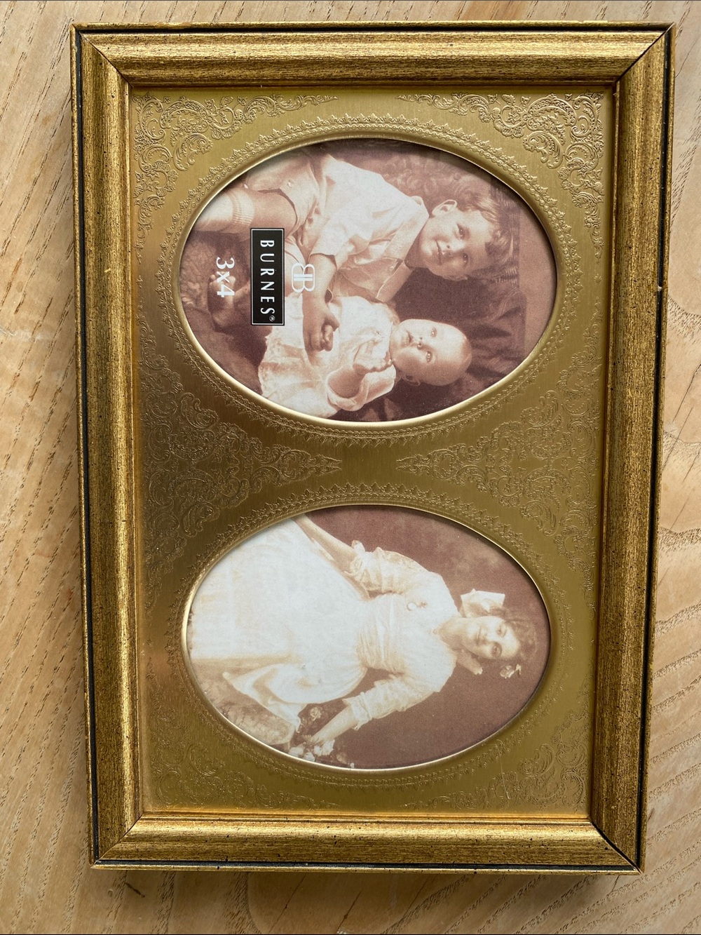 Burnes vintage double embossed tin oval wood  frame  3x4